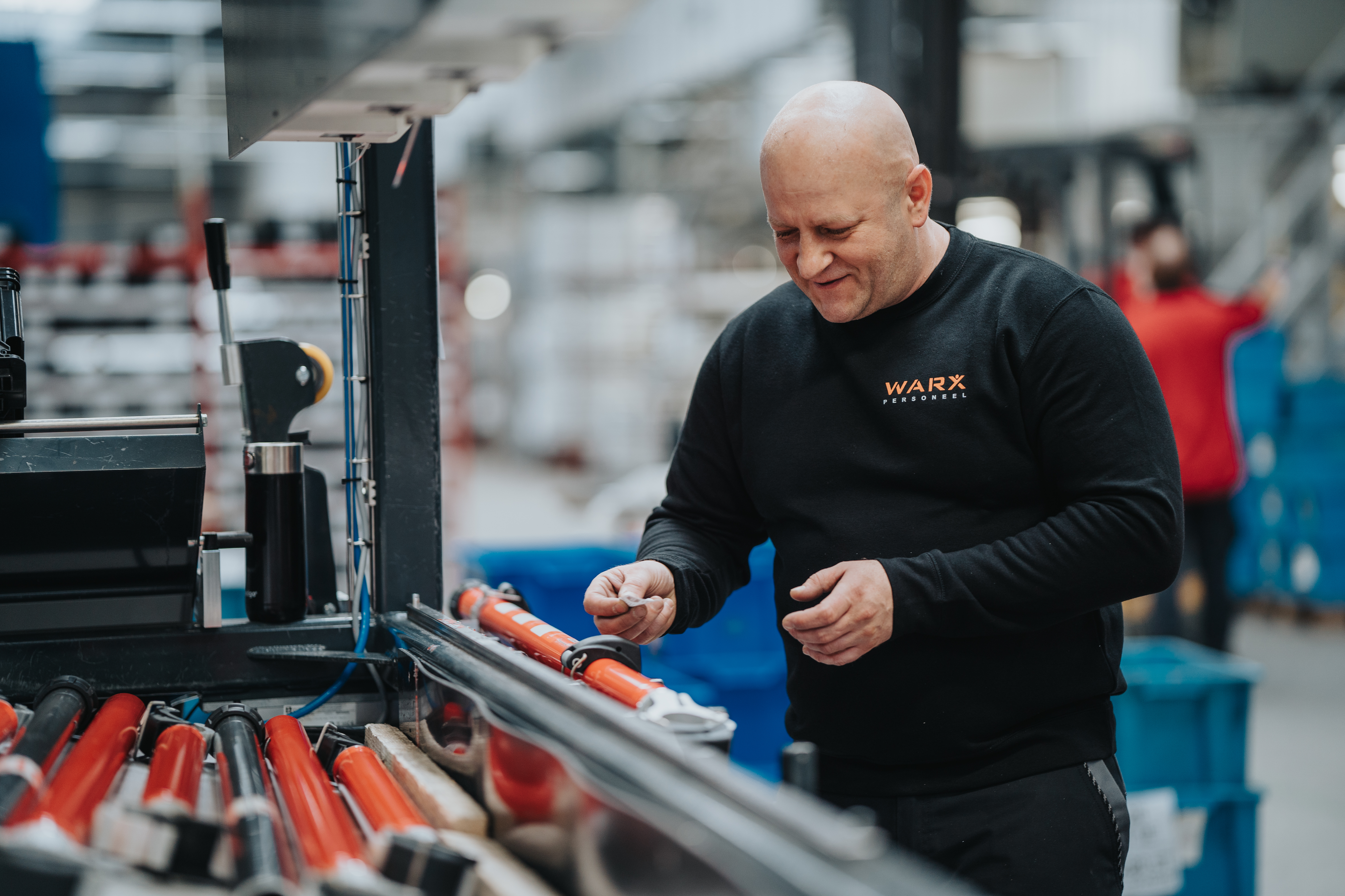 Productiemedewerker Warx. Poolse medewerker werkzaam in Nederland.